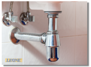 Leone plumbing installing drain in sink service.